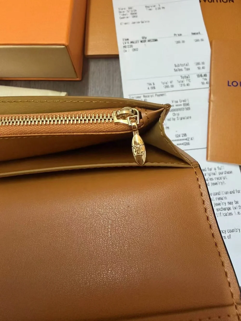 Louis Vuitton Black Pebbled Leather Long Wallet with Gold LV Emblem